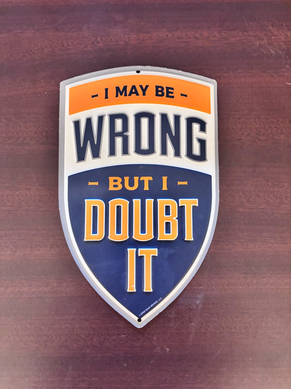 Hobby Lobby Navy and Orange 'I May Be Wrong But I Doubt It' Shield Wall Sign